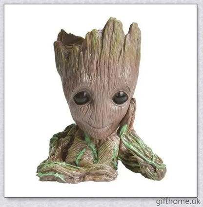 Decorative Groot-themed ceramic planter pot for displaying houseplants or organising desks