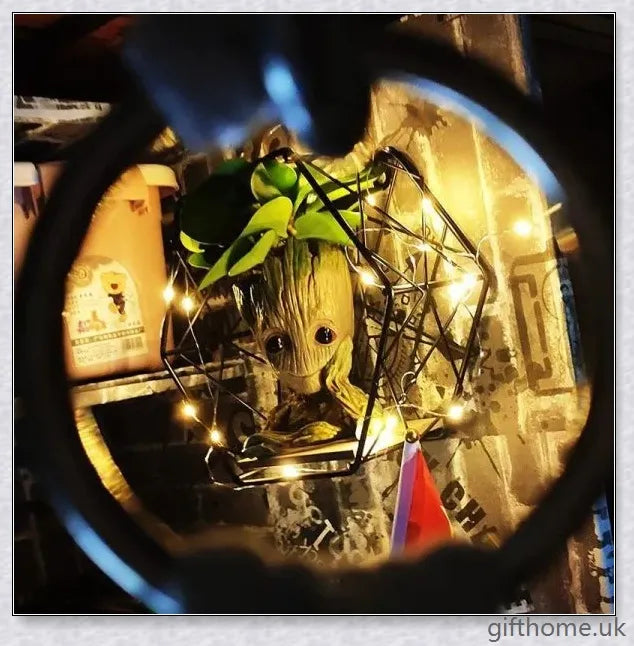 Decorative Groot-themed ceramic planter pot for displaying houseplants or organising desks