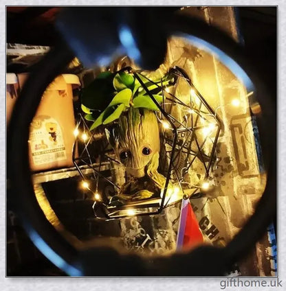 Decorative Groot-themed ceramic planter pot for displaying houseplants or organising desks