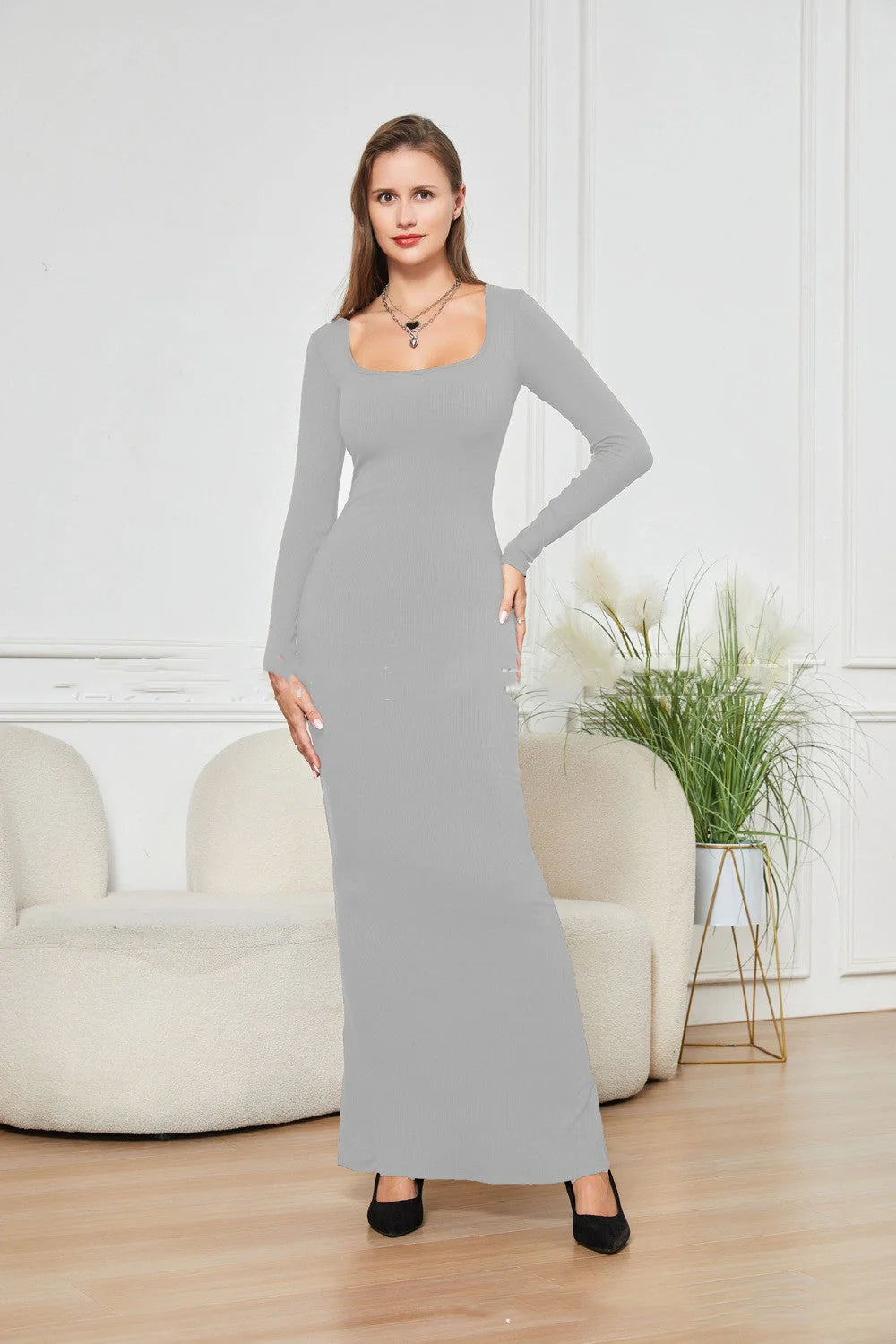 Double-layer slimming dress in black, featuring waist support and hip lifting design, perfect for any occasion.