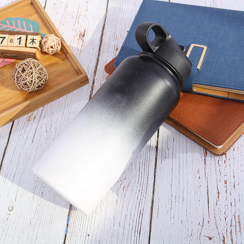 Premium stainless steel insulated tumbler with push-button lid and sleek design for outdoor adventures and active lifestyles.