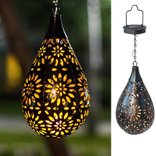 Solar-powered outdoor hanging lantern with flower-patterned shade, made of durable metal for long-lasting use in gardens, patios, and pathways.