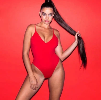 Stylish backless one-piece swimsuit in various vibrant colors for curvy women