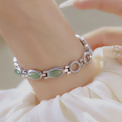 Luxury women's bracelet watch with Hetian Jade and Dongling Stone accents