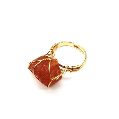 Handcrafted agate stone ring featuring an array of natural gemstones in various colours, with an adjustable design for a customized fit.
