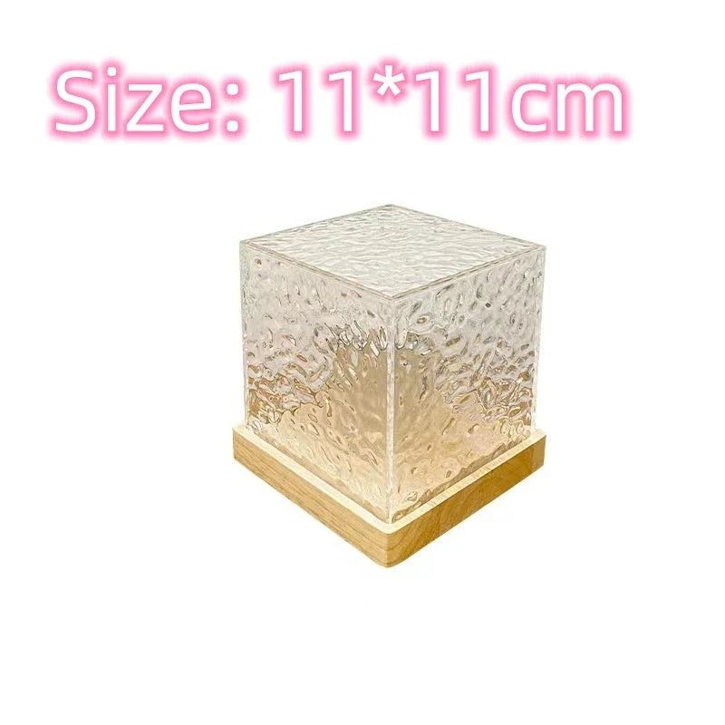 Enchanting water ripple ambient light with 16 color options, remote control, and rotatable design
