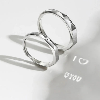 Stylish sterling silver rings with a hidden love pattern design, perfect for romantic gifts or personal accessorizing.