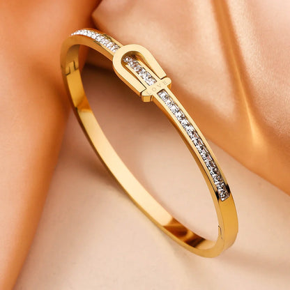 Gold-plated stainless steel fashion bracelet for women with gang drill elements