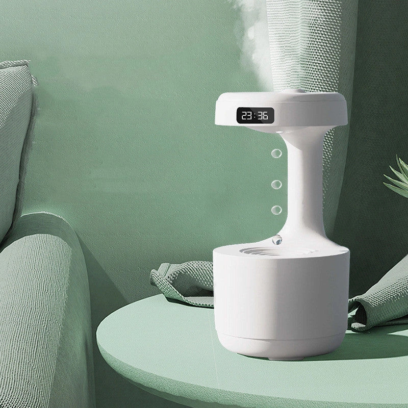Anti-gravity humidifier with LED display and aroma diffuser in white, green, and black