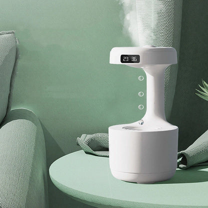 Anti-gravity humidifier with LED display and aroma diffuser in white, green, and black