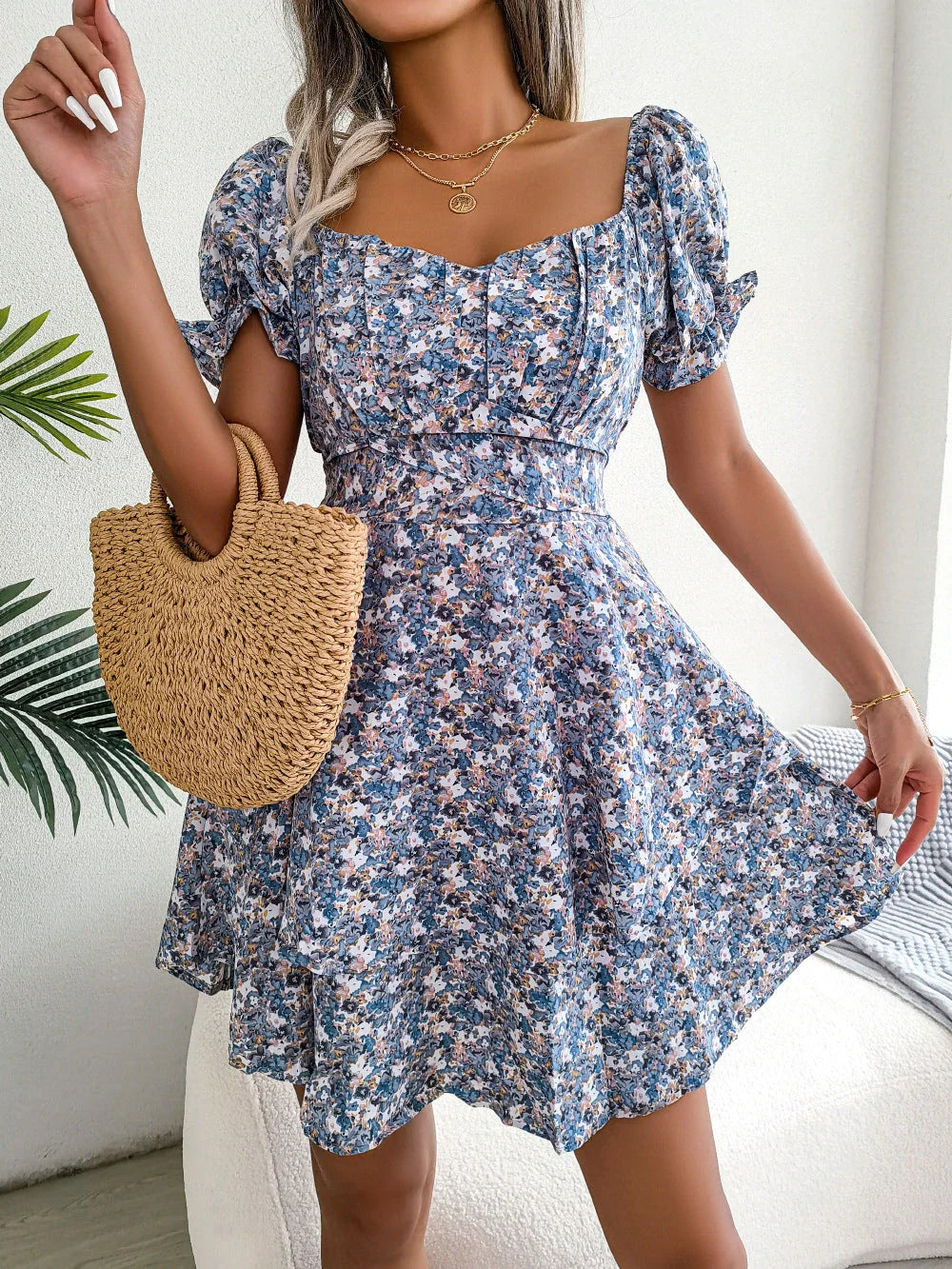 Stylish floral mini dress with A-line silhouette, high waist, and ruffled hem in various vibrant colors