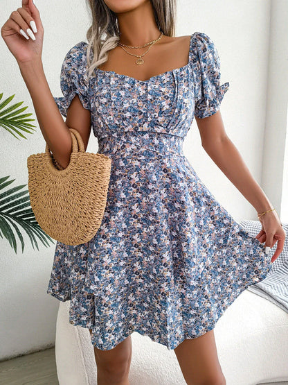 Stylish floral mini dress with A-line silhouette, high waist, and ruffled hem in various vibrant colors