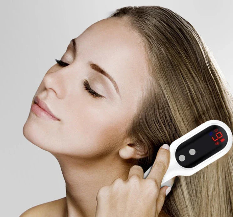 An electric hair growth comb with red and blue light therapy, magnetic massage, and customisable settings for promoting healthy hair growth.