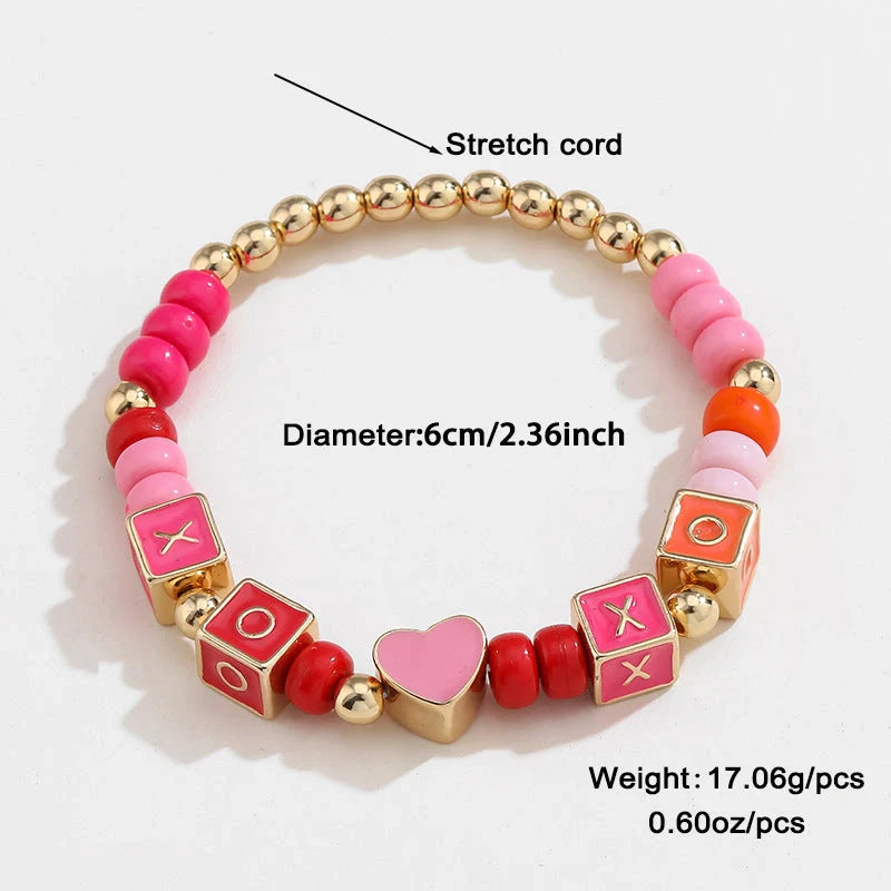 Elegant necklace and bracelet set with delicate beads and English letter charms, crafted with premium alloy materials