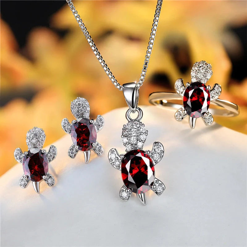 Stylish turtle pendant necklace with vibrant rainbow stones, perfect for women and children.