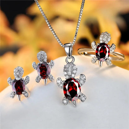 Stylish turtle pendant necklace with vibrant rainbow stones, perfect for women and children.