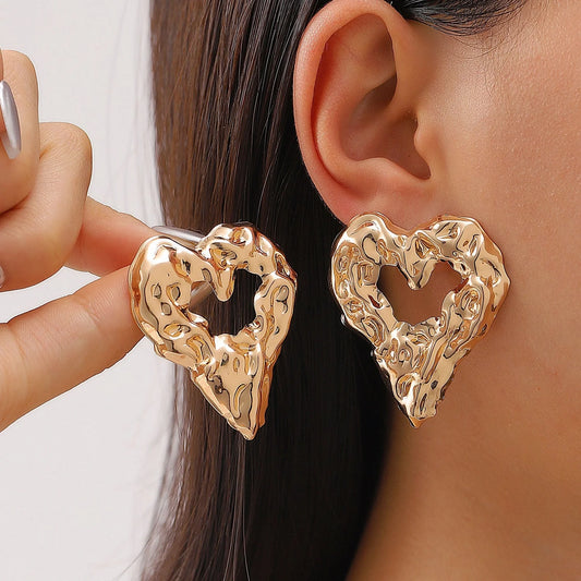 Stylish pleated lava hollow heart-shaped earrings for women, perfect for Valentine's Day.