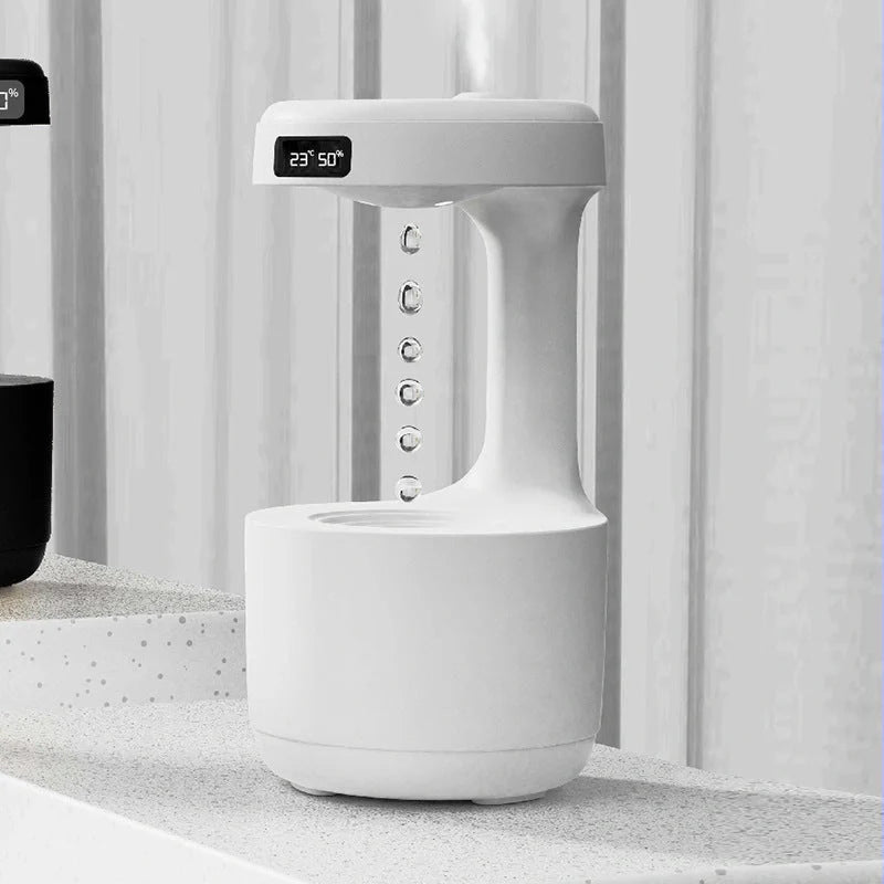 Anti-gravity humidifier with LED display and aroma diffuser in white, green, and black