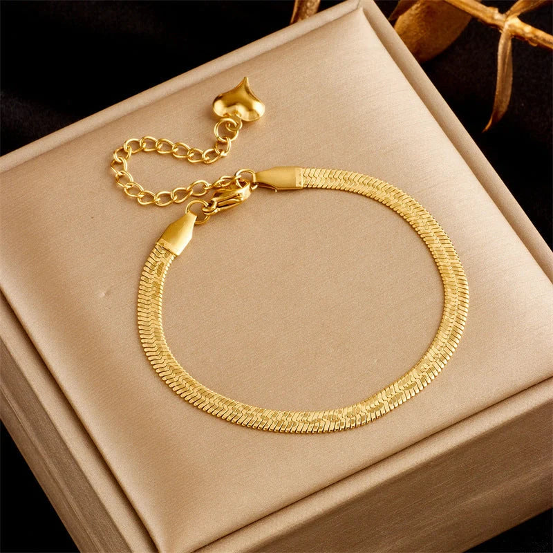 Gold plated punk fashion bracelet with double layer snake chain design and five-pointed star charm
