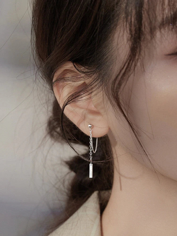 Elegant tasseled stud earrings featuring a contemporary geometric design in silver, gold, and 925 sterling silver finishes