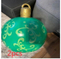 Vibrant inflatable Christmas baubles in a variety of colours and patterns, perfect for outdoor holiday decoration