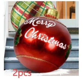 Vibrant inflatable Christmas baubles in a variety of colours and patterns, perfect for outdoor holiday decoration