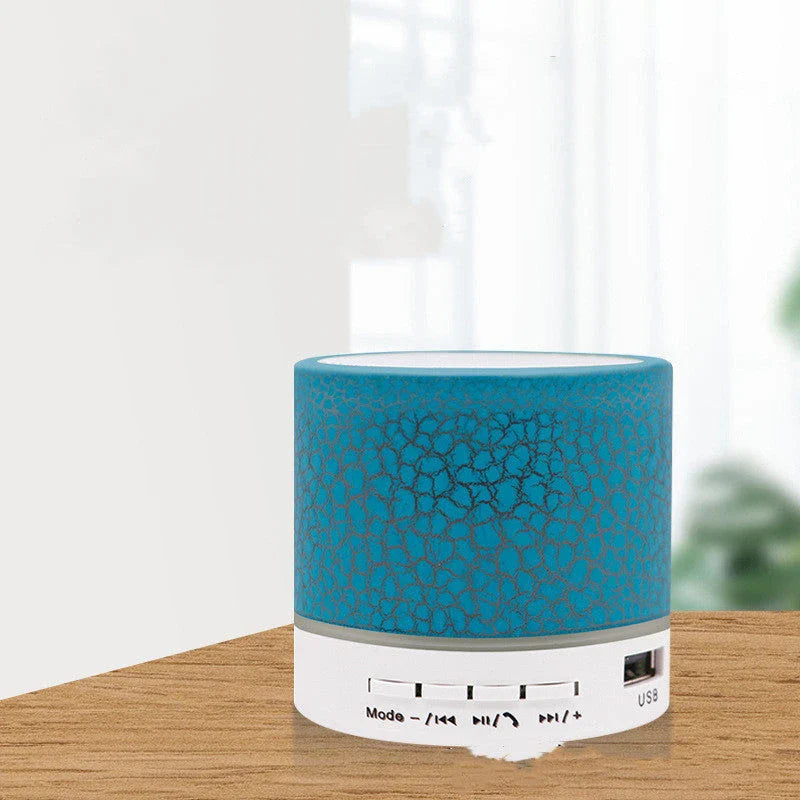 Portable Bluetooth speaker with colorful changing lights, high-quality audio, and durable design for on-the-go use