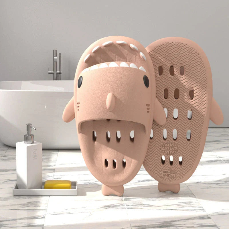 Fashionable shark-themed shower slides with drainage holes, featuring a realistic shark design, quick-drying EVA material, and non-slip traction.