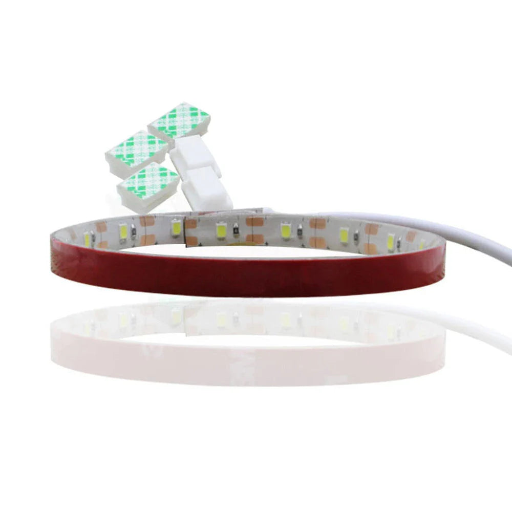 Adjustable LED light bar with touch-sensitive dimming controls for sewing machines, providing customizable lighting for sewing, quilting, and embroidery projects.