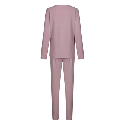 Cozy two-piece lounge set in soft cotton-blend fabric with crew-neck sweatshirt top and high-waisted drawstring pants