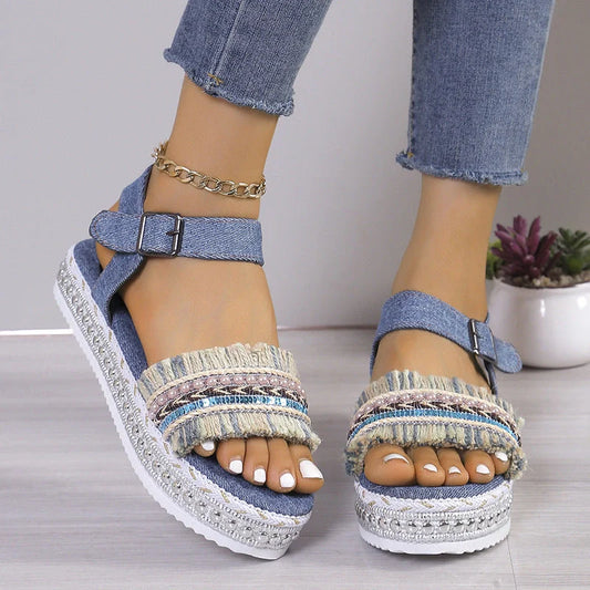 Stylish denim tassel sandals for women with thick flat sole, perfect for summer.
