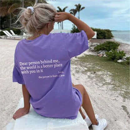 Women's graphic tee with playful slogan, available in various colors and sizes