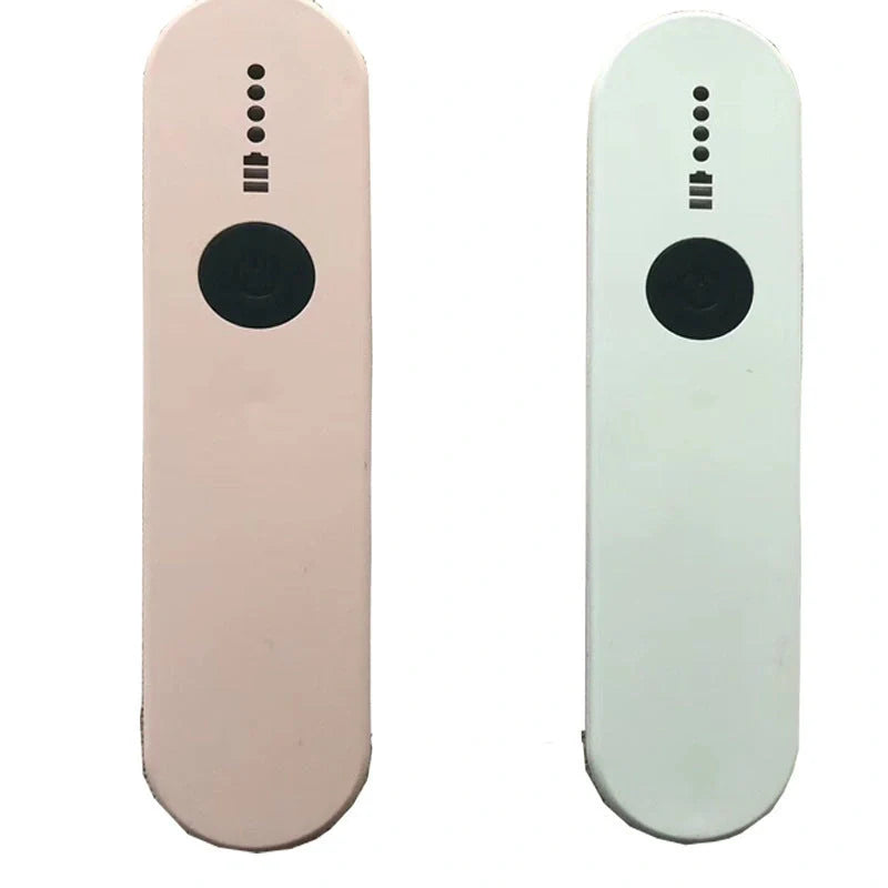 Portable UV disinfection lamp sterilizing a mobile phone