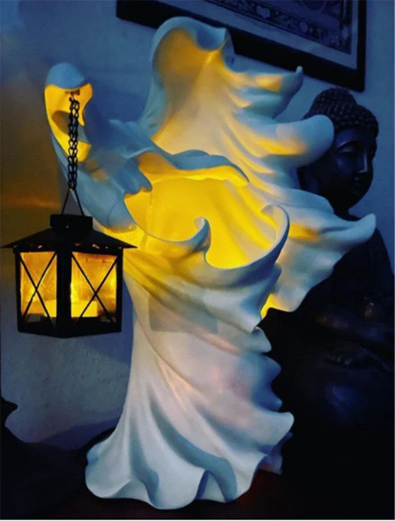 Handcrafted faceless ghost sculpture made of resin, perfect for Halloween decor and parties