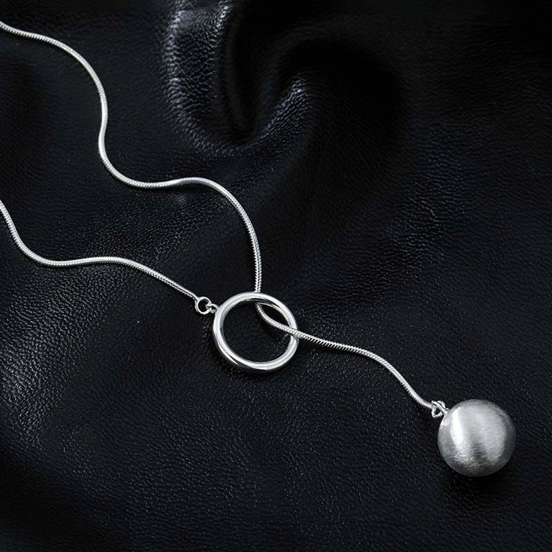 Platinum-plated round ball necklace with snake-bone chain, a versatile and elegant accessory for fashion-forward British women