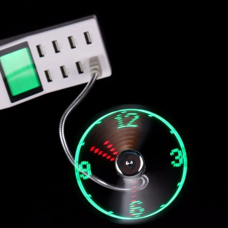 Adjustable USB desktop fan with LED light and digital clock, providing customizable airflow and workspace convenience