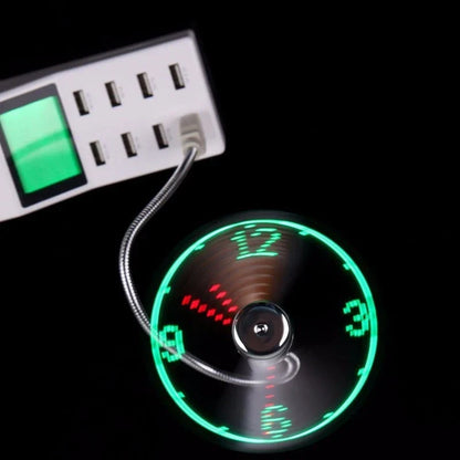Adjustable USB desktop fan with LED light and digital clock, providing customizable airflow and workspace convenience
