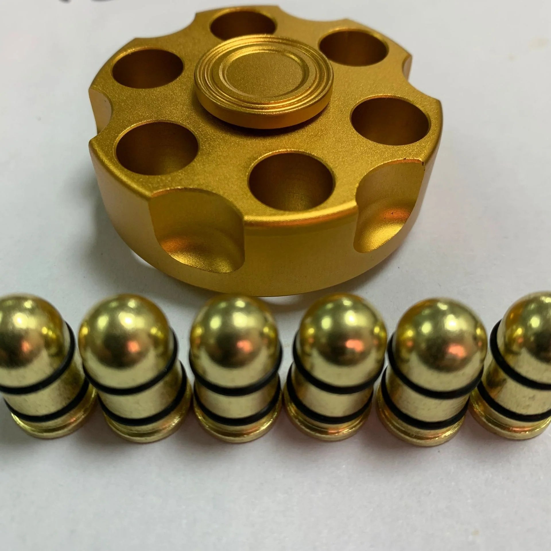 Brass gun revolver bullet fidget toy spinner with detachable rotating feature
