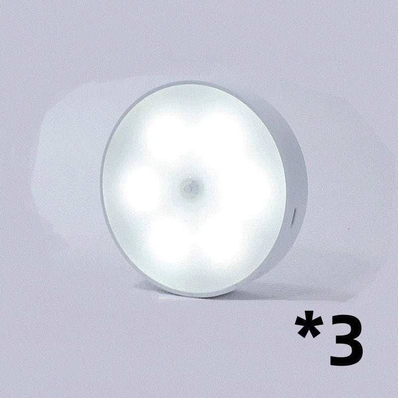 Motion-activated LED puck lights in warm and white color options, with various pack sizes and USB recharging