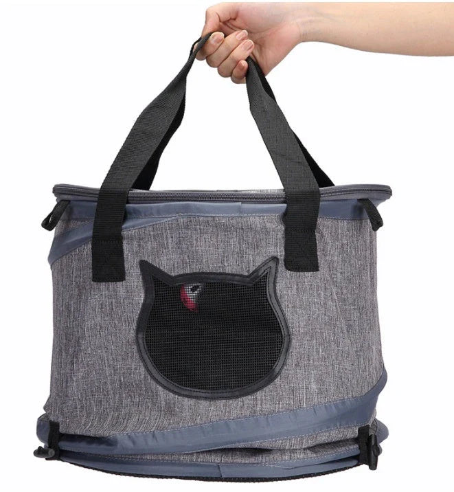 Collapsible pet carrier bag made of durable Oxford cloth, accommodating pets up to 18kg with a unique skylight design and lightweight, foldable construction