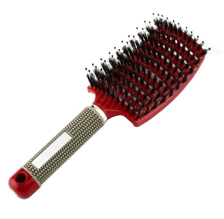 A premium hair brush with a sleek design, featuring soft bristles and a rounded massage function for healthy, detangled hair