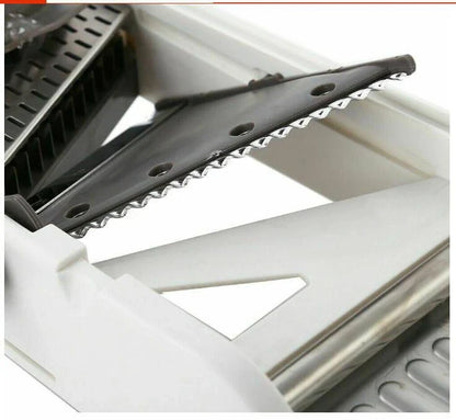 The Versatile Vegetable Slicer with adjustable slicing, shredding, and waffle cutting capabilities for easy meal preparation
