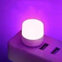 Compact USB LED night light with soft glow for reading and sleep