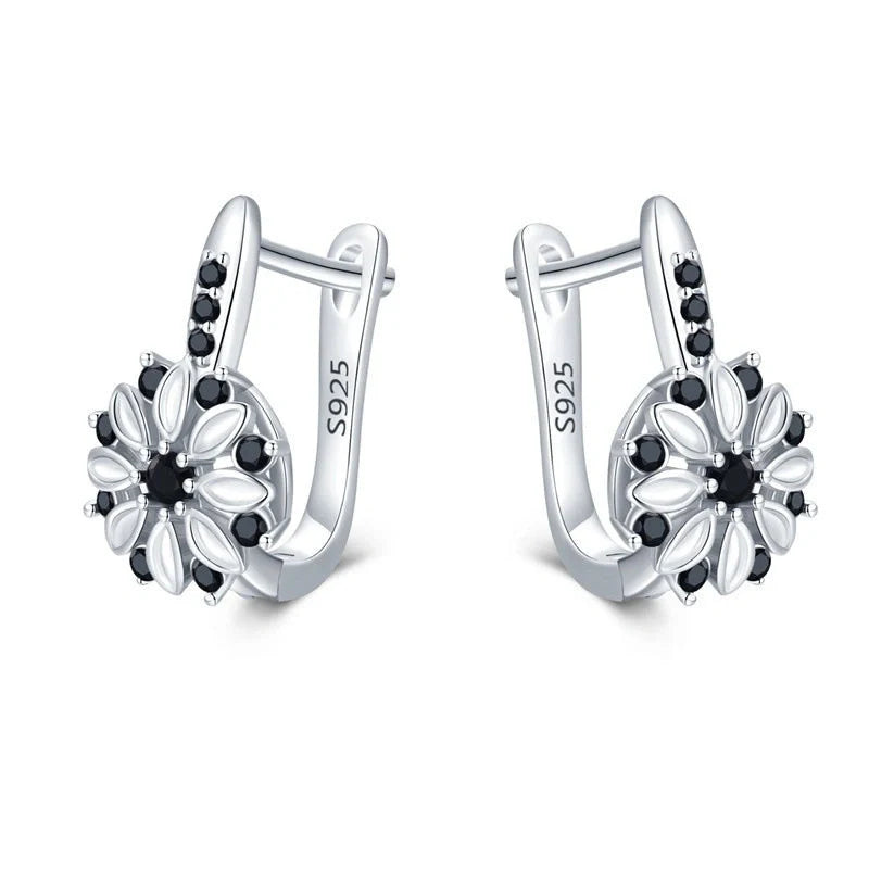 Elegant copper flower earrings with sparkling zircon accents, perfect for any occasion.