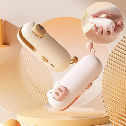 A compact, rechargeable bag sealer with a unique cartoon design, perfect for preserving food freshness at home or on the go.