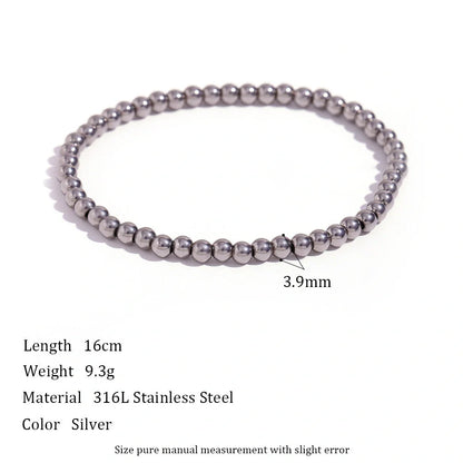 Vintage-inspired stainless steel and 18K plated elastic bead bracelet in a range of sizes and colours