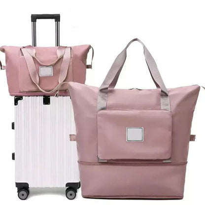 Expandable travel duffel bag with adjustable shoulder strap, multiple interior pockets, and water-resistant Oxford cloth material