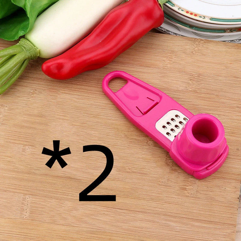 Eco-friendly garlic press and seasoning grinder in rose and green