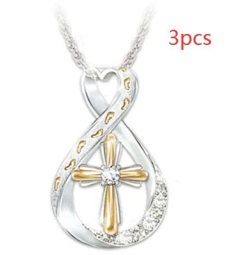 Elegant two-tone cross pendant with diamond-like accent, versatile and durable alloy design for everyday or special occasions.