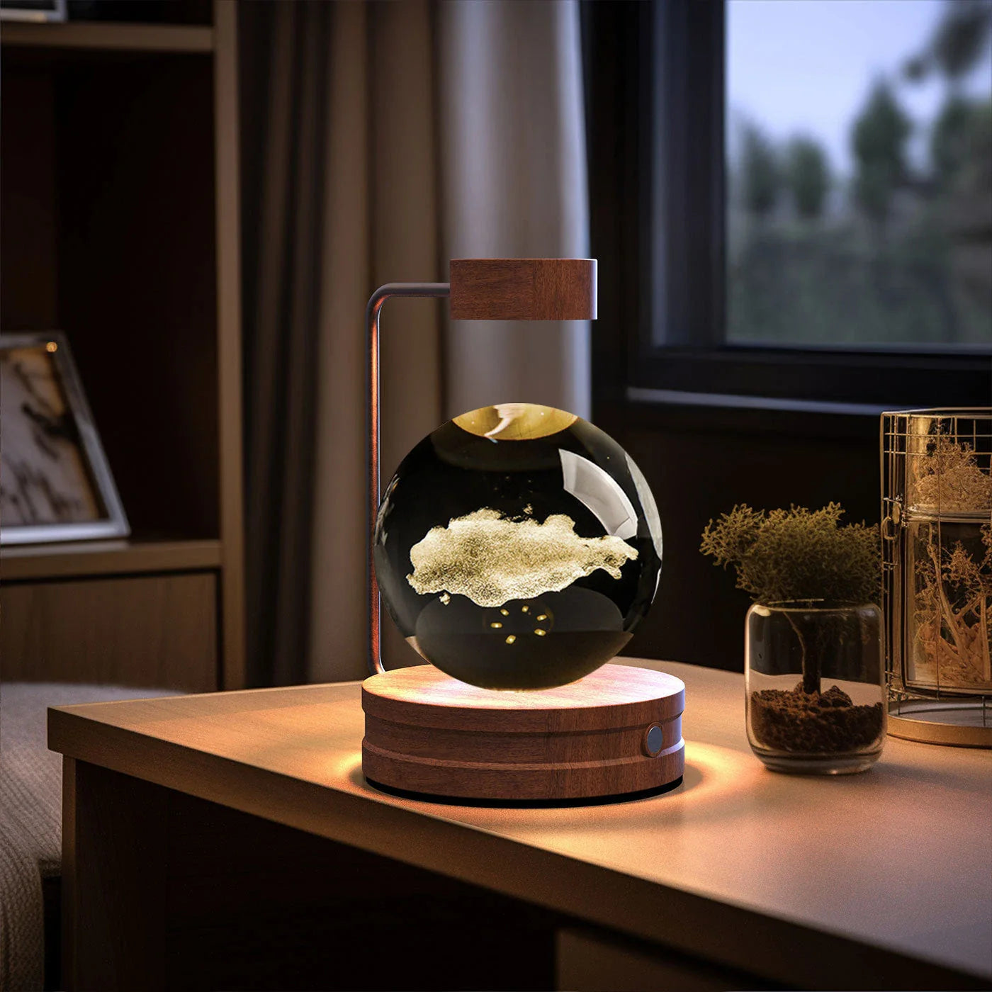 Enchanting crystal ball night light with cosmic designs, creating a warm and soothing ambiance in any room.